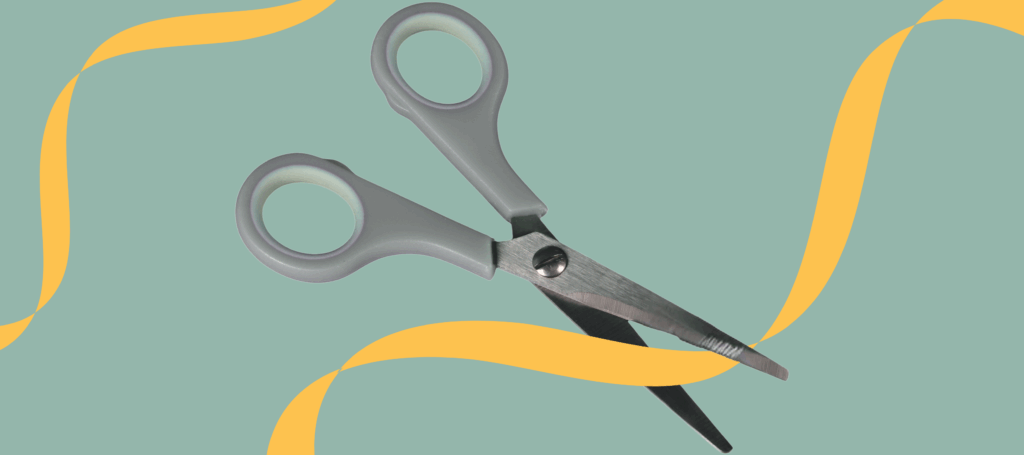 Image of scissors cutting through a ribbon to signify the cutting of RBA rates.
